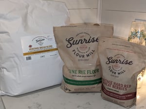 Three bags of various kinds from Sunrise Flour Mill.